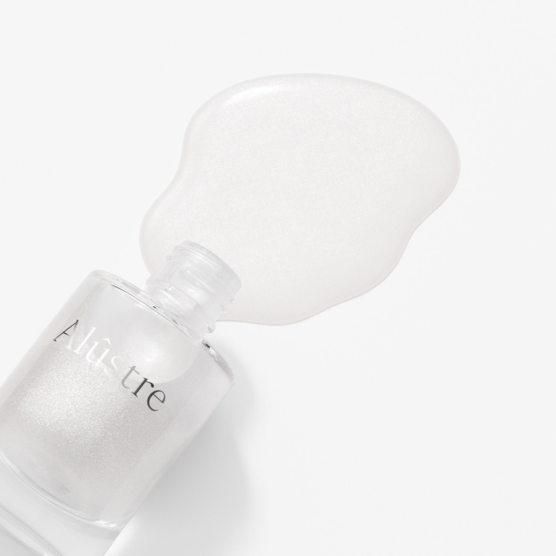 Alûstre Packshot Creative 010P TOP COAT 01 (1)
